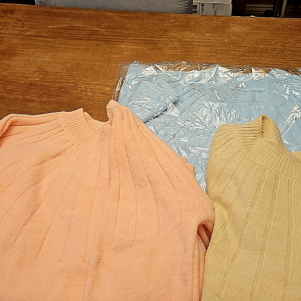 3 brand new, long sleeved ladies sweaters.